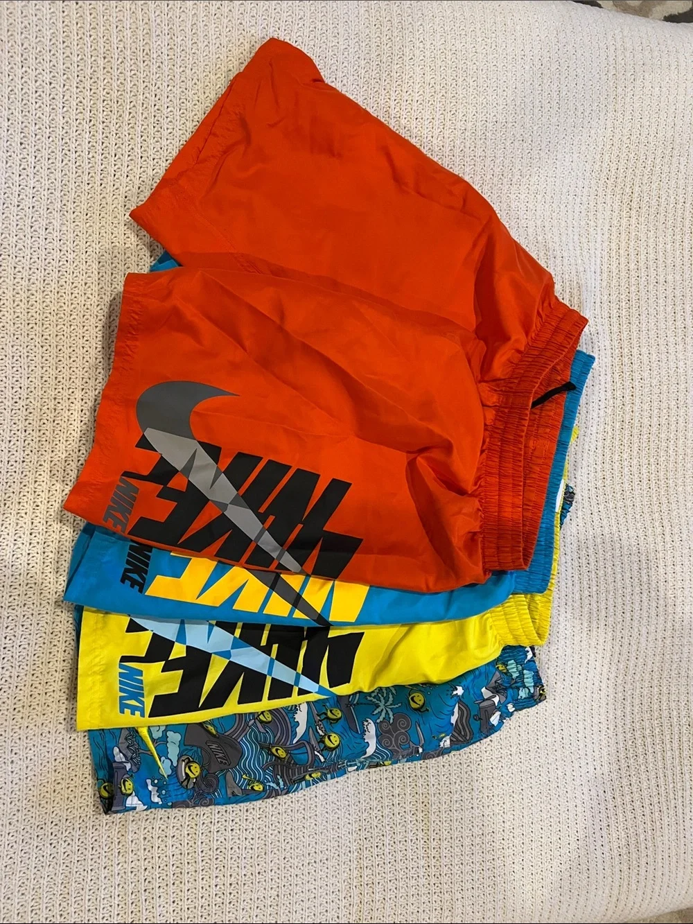 Nike Kids Bright Orange Swim Shorts with Black Logo